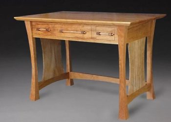 What is a writing desk called and how does it differ from other desks